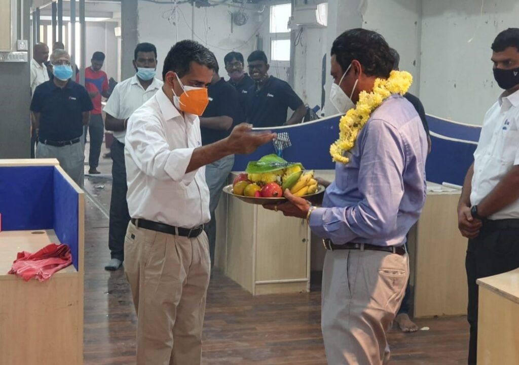 Indian Headquarters employees sharing a meal.