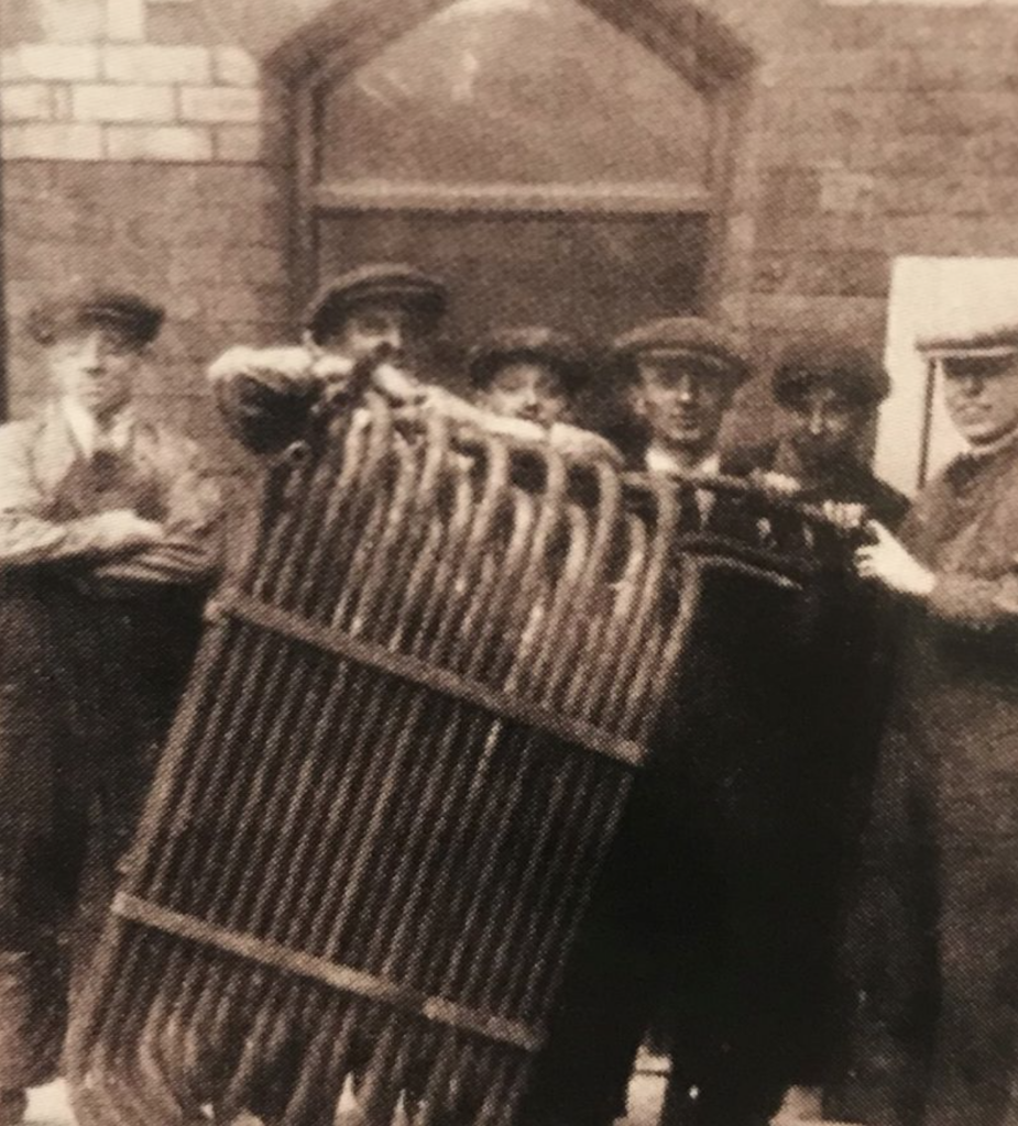 Old picture with men and pipes